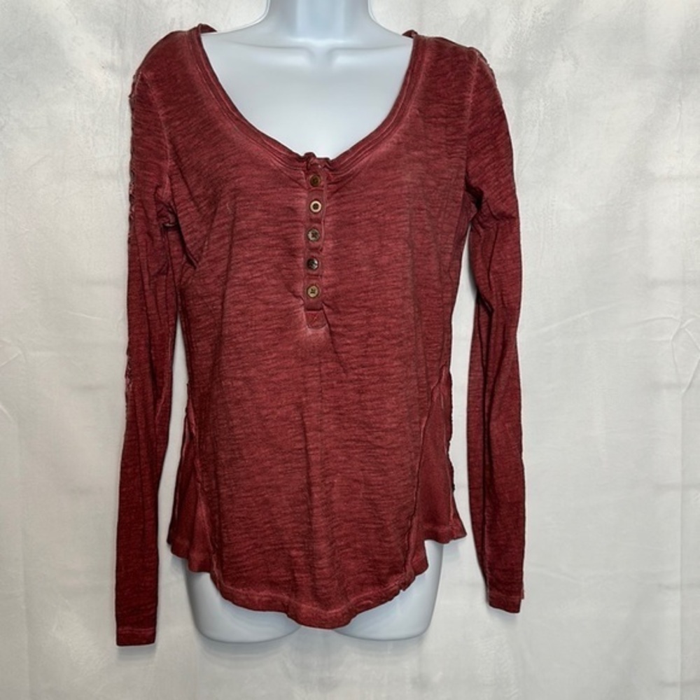 Free People burgundy long sleeve button top with lace design on sleeves